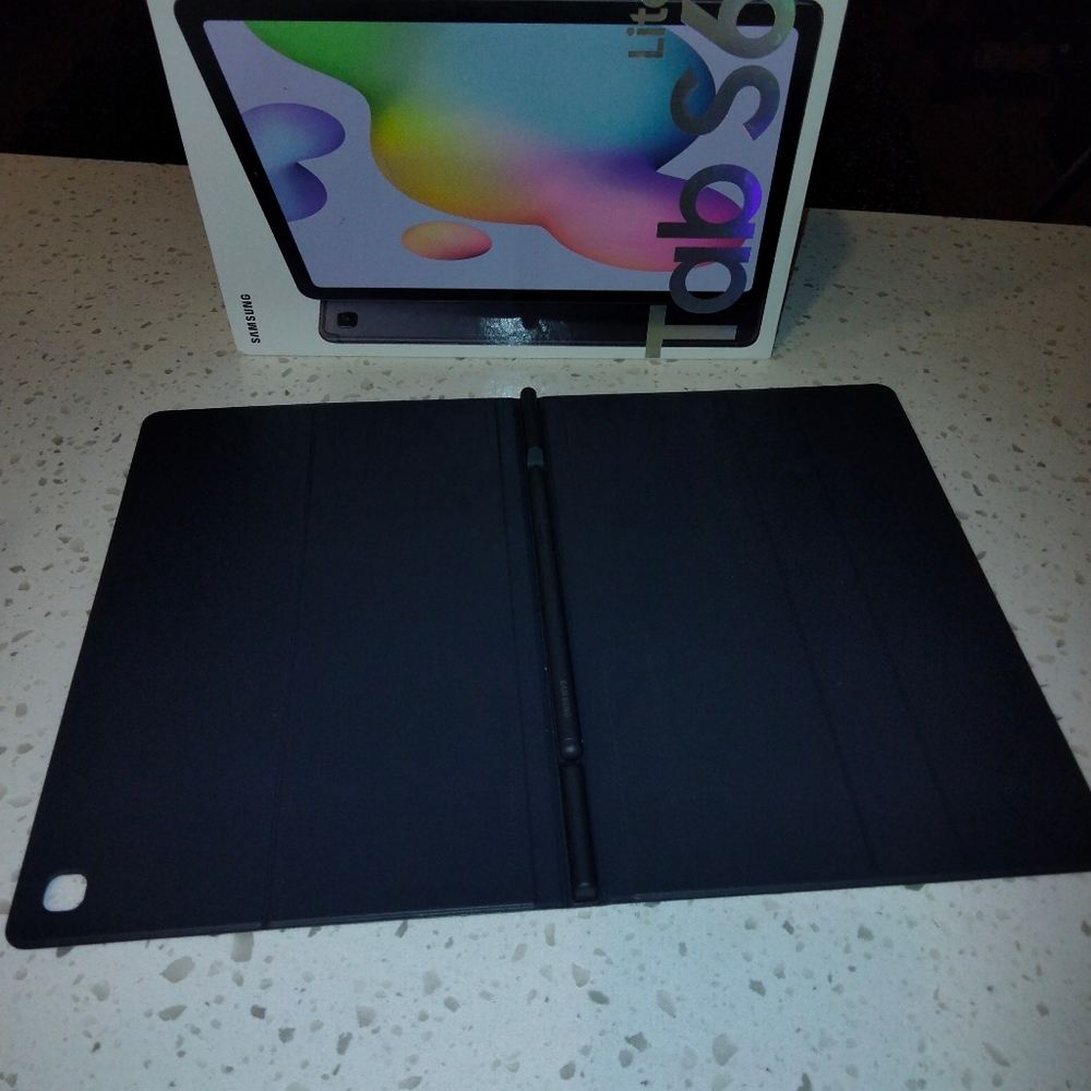 Tablet holder with stylus